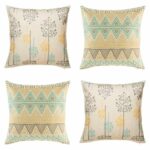 Four cushion with aztec print and plant pattern in pastel hues.