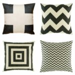 four cushion cover with big cross, big chevron,squares and thin chevron in black colour.