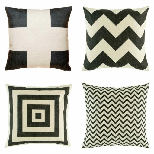 four cushion cover with big cross, big chevron,squares and thin chevron in black colour.