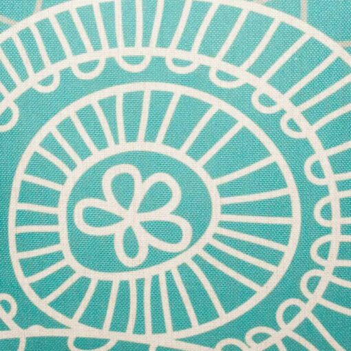 closer look at cushion cover with Teal Twirl pattern.