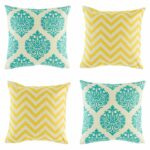 4 cushion cover with ikat and chevron prints in Teal and Yellow colours.