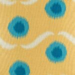 closer look at cushion with Blue Circle and Yellow pattern.