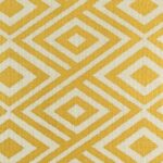 closer look at cushion cover with Gold Diamond Link pattern.