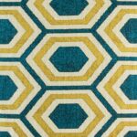 closer look at cushion cover with Blue and Gold Hexagon pattern.