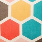 closer look at cushion cover with Multi Colour Honeycomb pattern.