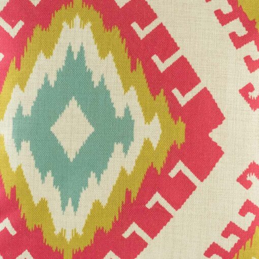 closer look at cushion with Red Yellow and Teal Ikat pattern.