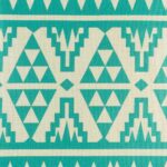 closer look at cushion with Teal Tribal pattern.