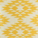 closer look at cushion cover with Gold Ikat pattern.