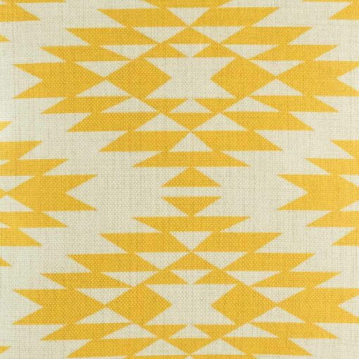 closer look at cushion cover with Gold Ikat pattern.