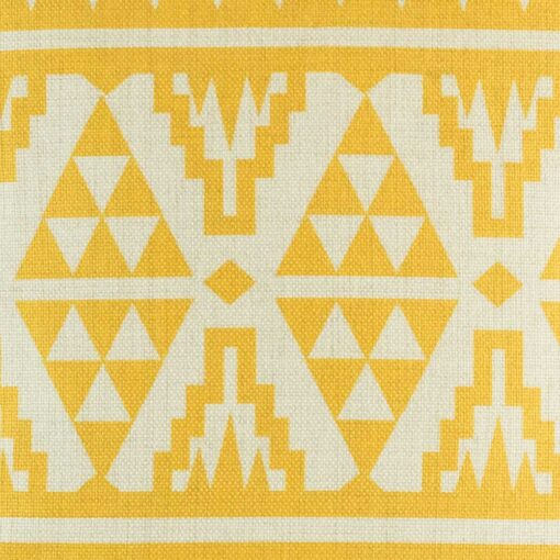 closer look at cushion cover with Gold Tribal pattern.