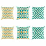 6 cushion in colours yellow and teal with chevron and diamond patterns.
