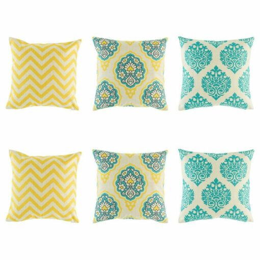 3 pairs of patterned cushion with chevron and ikat patterns in Yellow and Teal colours.