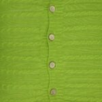 close up of the front side of a buttoned cable knit cushion cover.