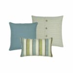 one blue cushion, one cable knit cushion with buttons and one big stripes cushion.