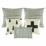 one rectangular cushion cover, one black and white with big cross cushion cover, one pine tree printed cushion, two cushion with black and white stripes
