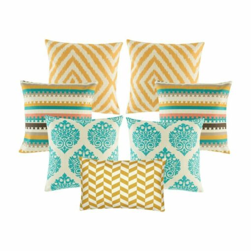 Four multi patterned cushion in gold and teal colours with diamond, zigzag and crown designs.