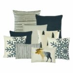 2 rectangular cushion with moose and stripes design, 3 snowflakes and pine trees patterned cushion in grey, 2 plain grey cushion and a stripes square cushion and 1 knitted cushion