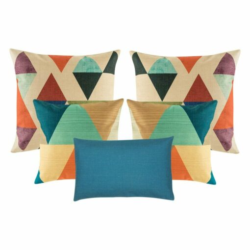 four pieces of multicolored cushion cover and one blue rectangular cushion cover