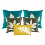 A pair of teal cushion, a pair of grey cushion, and one yellow rectangular cushion
