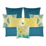 A pair of plain blue cushion, 5 multi patterned cushion cover in yellow, blue and white colours, and two plain rectangular cushion.