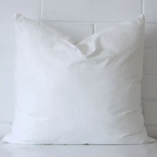 A 45x45 cushion insert inner made with a faux feather filling.
