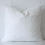 A 55x55 cushion insert inner made with faux feather filling.