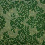 Close up image of green watercolour motif cushion in 45cm x 45cm size