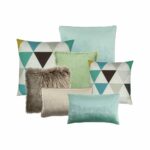 A set of seven cushion covers in green, brown and fawn colours and patterns with velvet, plain and fluffy textures.