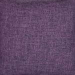 Magnified photo of a soft cushion cover in a vibrant purple colour