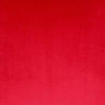 Close up photo of Cerise red cushion cover made of velvet fabric