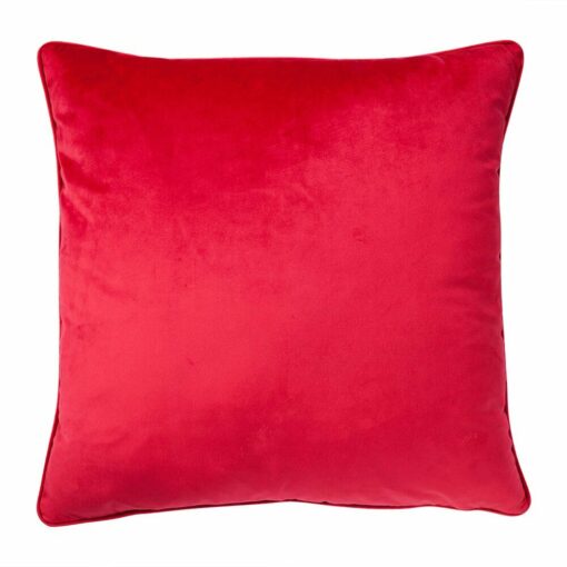 Photo of Cerise red cushion made of velvet material