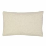 A plain linen rectangle cushion shot from the back