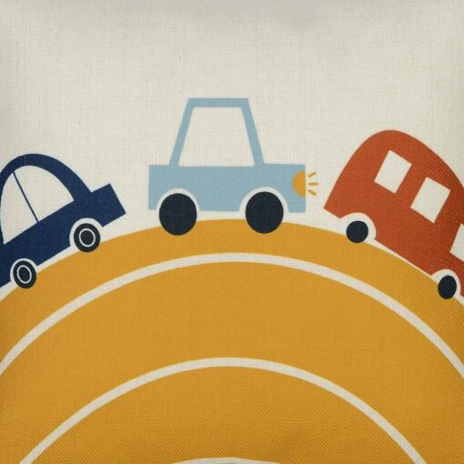 Close up photo of colourful cute cars in yellow hill cushion