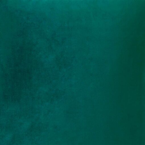 Close up image of emerald green velvet cushion cover
