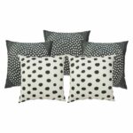 Photo of 5 cushion cover collection in black and white outdoor fabric