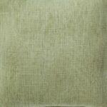 Close up image of cushion cover made of green cotton material