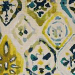 Close up image of yellow, teal and blue cushion cover with Farsi motif