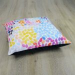 Photo of watercolour inspired large floor cushion with black back linen