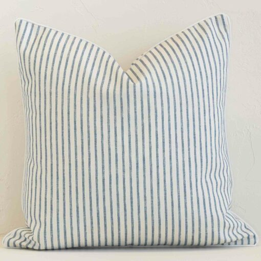 Front view of square cushion. Crafted from a special outdoor material in a blue stripe colour.