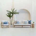 Set of 7 horizon cove outdoor sofa cushions is arranged neatly on a white sofa.