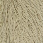 Close up photo of 30cm x 50cm rectangular faux fur cushion in ecru colour
