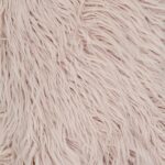 Close up image of 30cm x 50cm faux fur rectangular cushion in pink colour