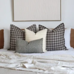 A creatively designed bed with the Jude bed cushion set consisting of four charming designer cushions.