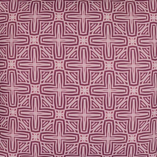 Close up photo of pink water and mould resistant outdoor cushion cover with cross pattern