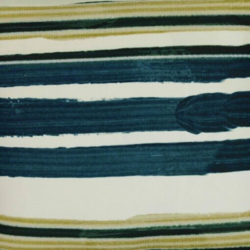 Close up image of teal and olive green outdoor cushion made of UV resistant fabric