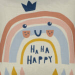 Close up photo of square cushion with colourful happy rainbow
