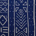 Close up image of Mali inspired blue and white rectangular cushion