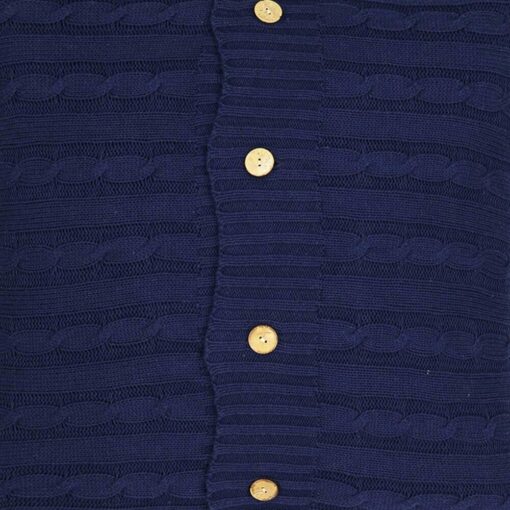 Close up of navy blue knit cushion with buttons