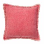Image of red sand blasted cushion made of cotton material