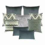 A pair of plain grey cushion cover, a pair of cream and grey cushion cover with diagonal patterns, a grey fur cushion, a cushion cover with zigzag pattern, a chevron cushion cover and two plain rectangular cushion in grey